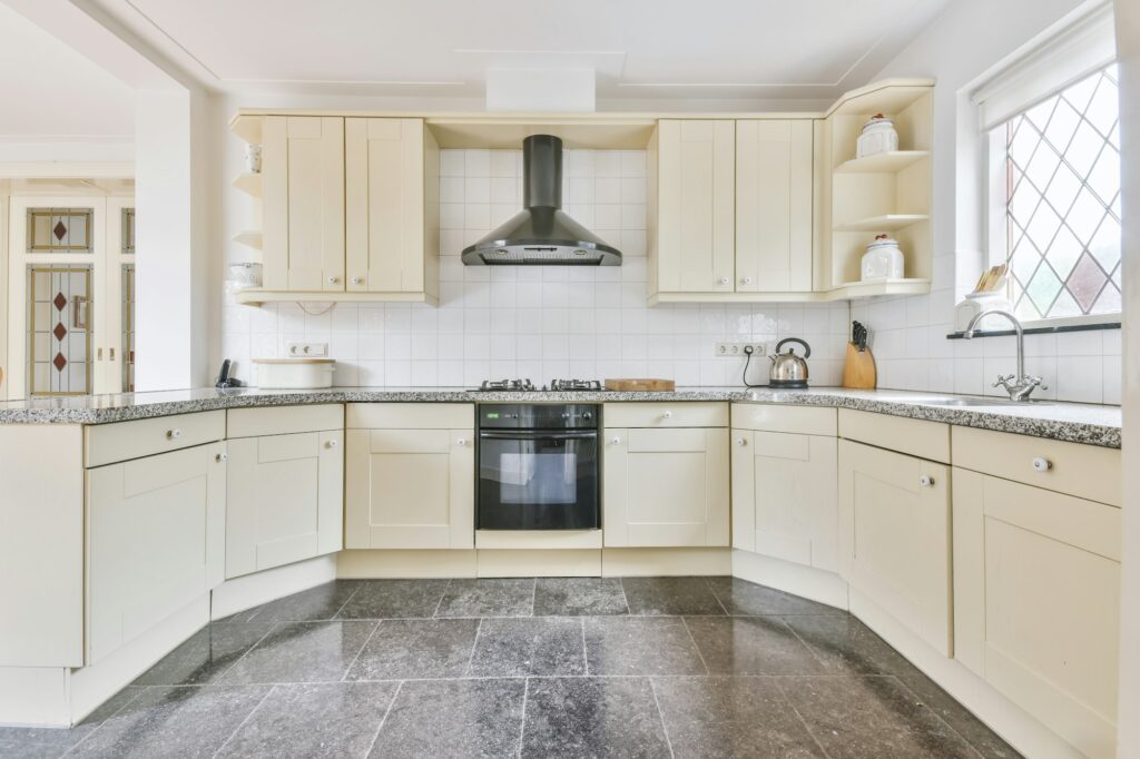 Large kitchen with beige kitchen unit